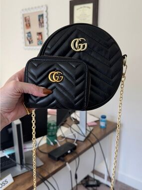 Traditional round black crossbody and zip around wallet